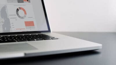 Laptop with carbon accounting dashboard illustration