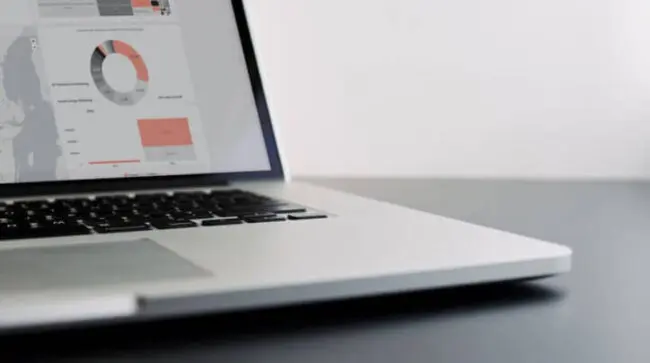 Laptop with carbon accounting dashboard illustration